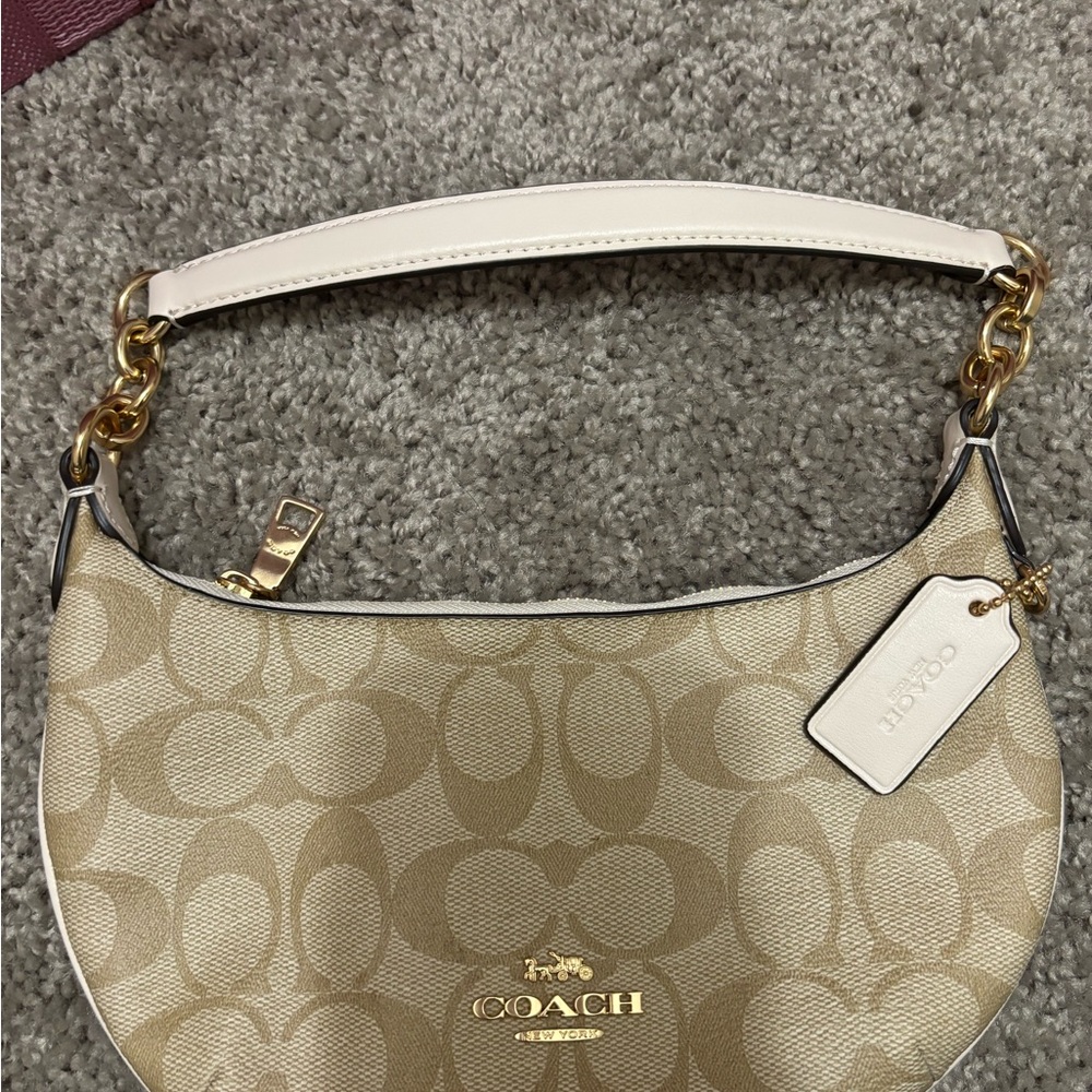 Coach tan baguette purse